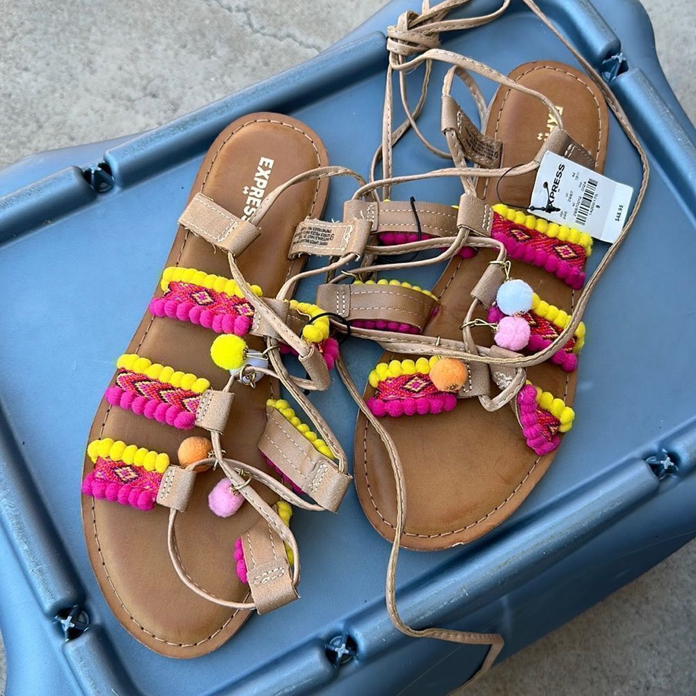Super cute tie up Pom Pom sandals